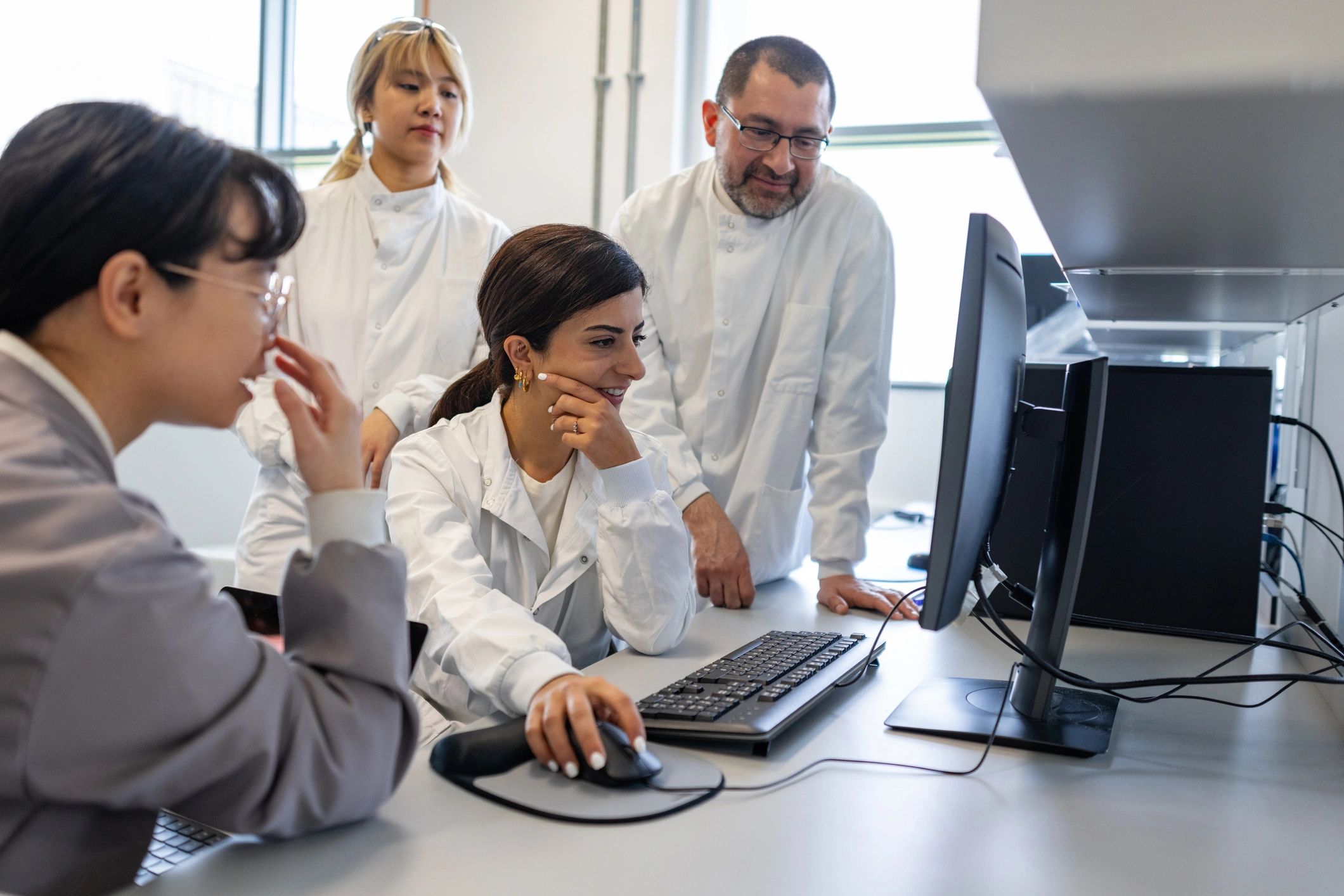 Scientists collaborating in a modern laboratory